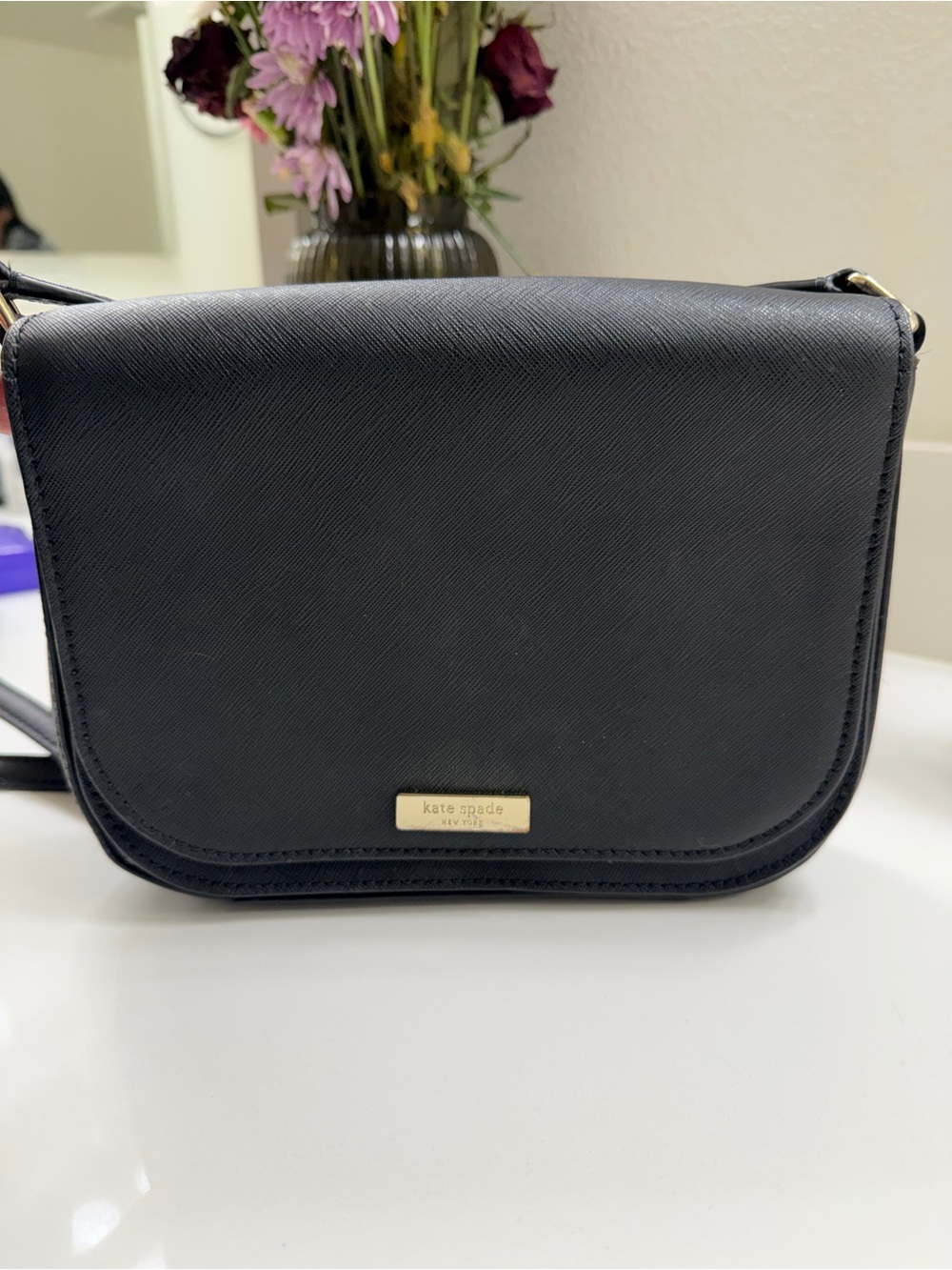 kate spade black saffiano leather crossbody bag with gold plaque